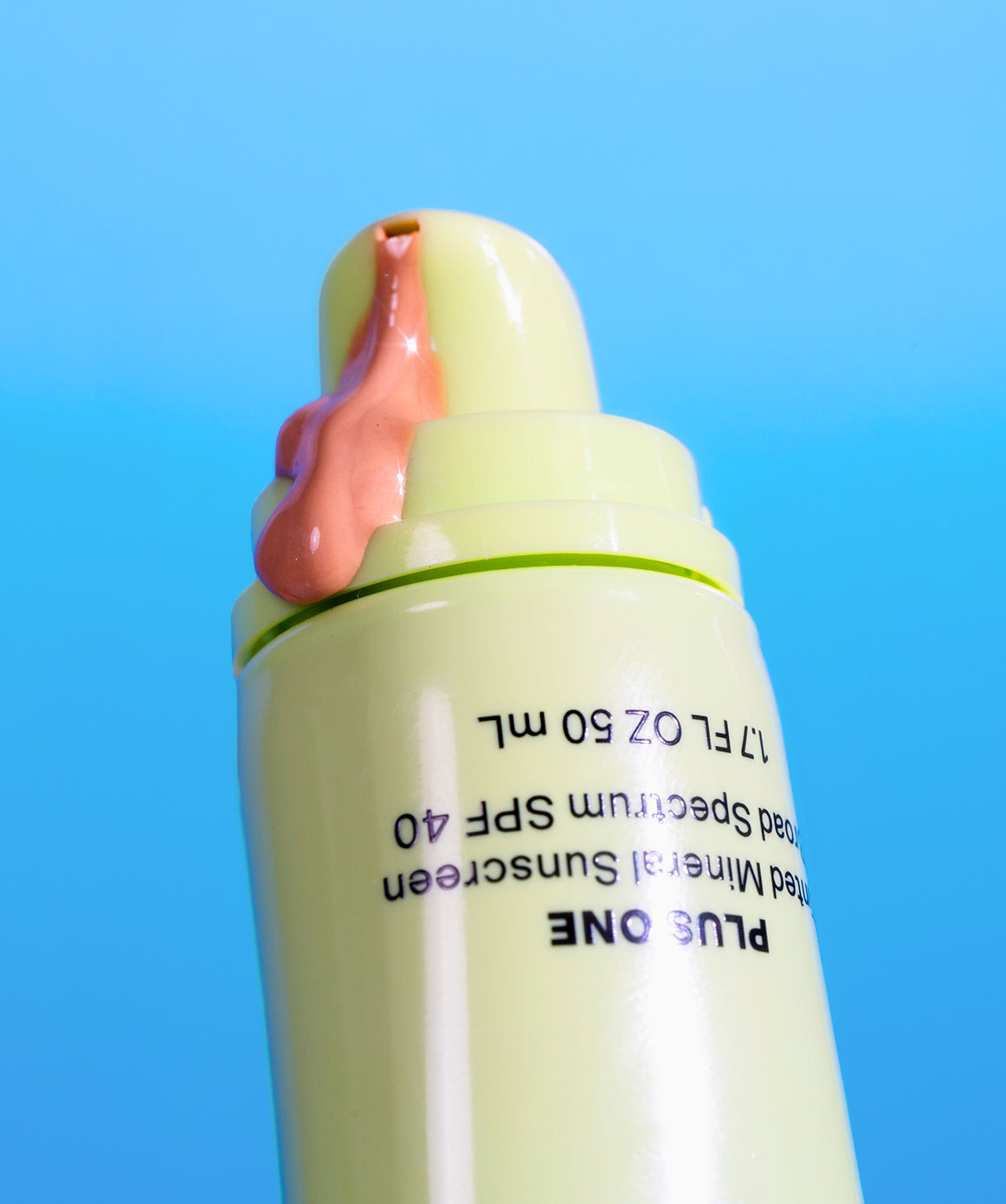 tinted mineral sunscreen SPF 40 squirting out of product tube